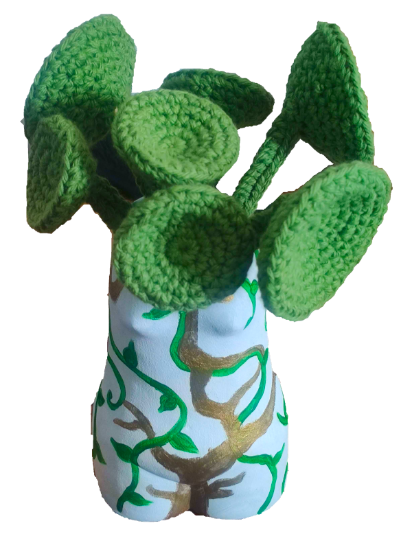 A crochet money plant in a painted vase.